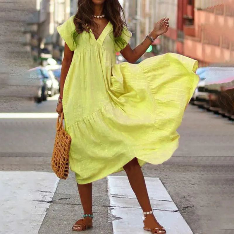 V-neck dress with asymmetrical skirt - maxi dress